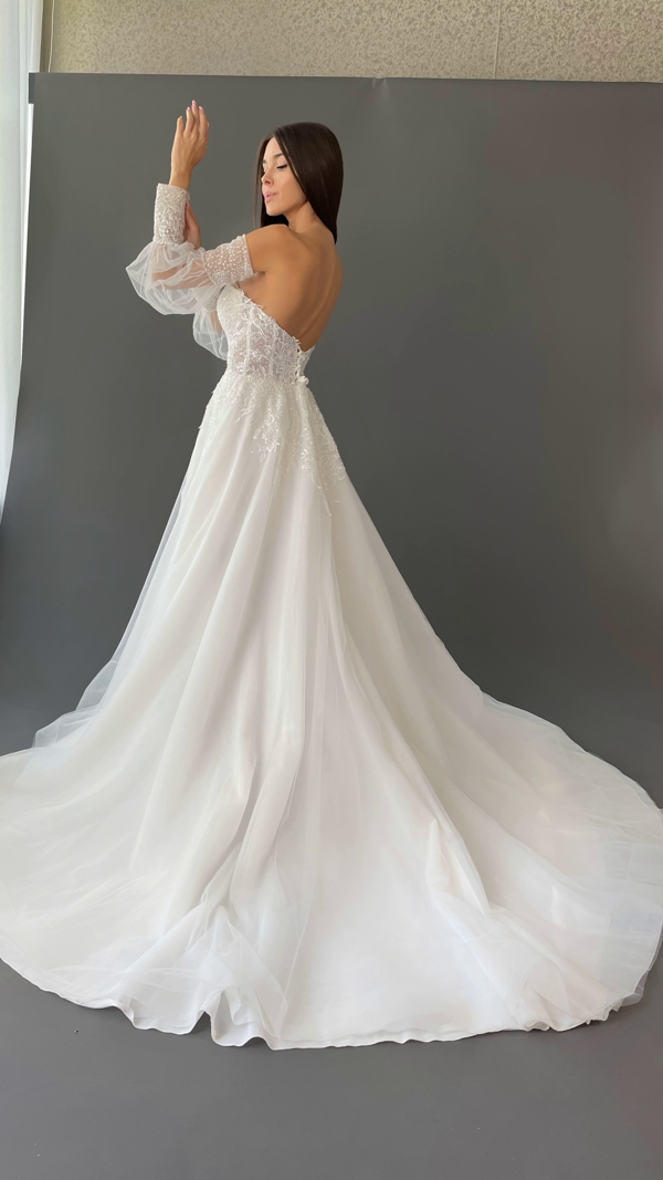 свадебные платья с широкими рукавами, свадебное платье трансформер, свадебное платье с объемными рукавами, свадебное платье с разрезом, свадебное платье с открытыми плечами, белое свадебное платье с рукавами, свадебные платья с пышными рукавами фонариками, свадебное платье а силуэт с рукавами, свадебные платья с рукавами салон, платья на свадьбу с длинным рукавом, белоснежное свадебное платье 2022, свадебное платье айвори, свадебное платье со шлейфом 2022, свадебное платье с шлейфом, свадебное платье с декольте, свадебные платья, свадебные платья минск, свадебный салон минск, купить свадебное платье, свадебный салон, свадебное платье напрокат, купить свадебное платье в минске, свадебные платья 2022, свадебное платье 2022 тренд, свадебные платья прямые в пол, легкое свадебное платье, свадебные платья для беременных, свадебное платье с открытой спиной, свадебные платья для свадьбы на пляже, блестящее свадебное платье, пышные блестящие свадебные платья, пышное свадебное платье с корсетом, свадебные платья с корсетом, свадебное платье корсет с рукавами, свадебное платье трансформер, белое свадебное платье с длинным рукавом